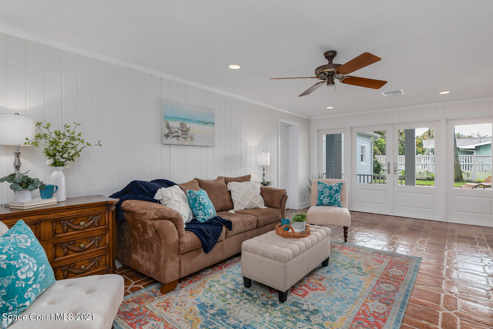 200 Melbourne Avenue Indialantic, FL 32903 - Photo 30 of 62 a living room with furniture and a large window