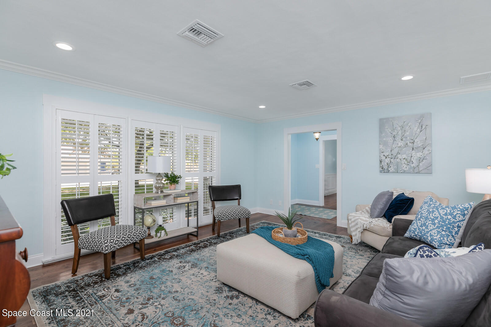 200 Melbourne Avenue Indialantic, FL 32903 - Photo 41 of 62 a living room with furniture and a large window