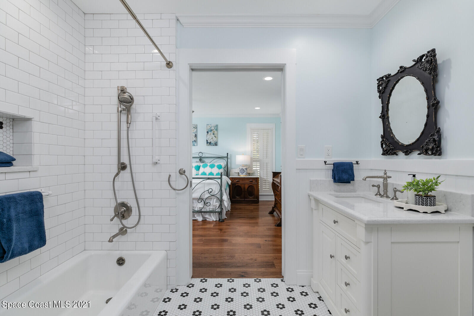 200 Melbourne Avenue Indialantic, FL 32903 - Photo 46 of 62 a bathroom with a bathtub sink and mirror