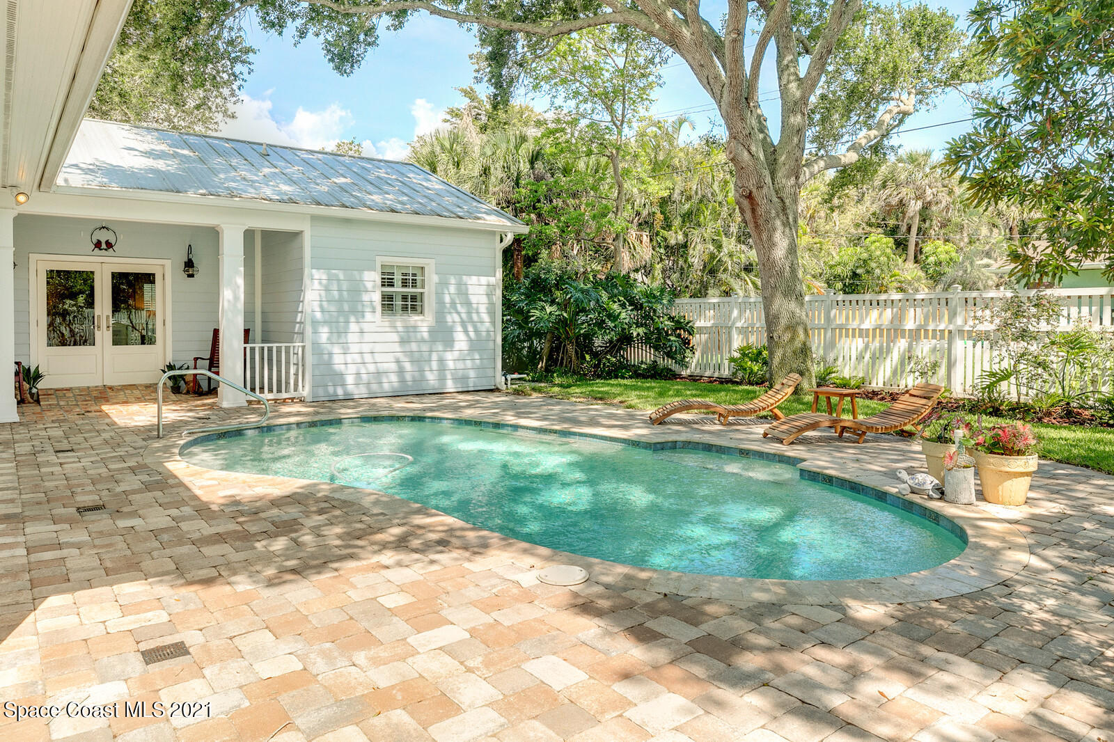 200 Melbourne Avenue Indialantic, FL 32903 - Photo 10 of 62 a view of a house with backyard and sitting area
