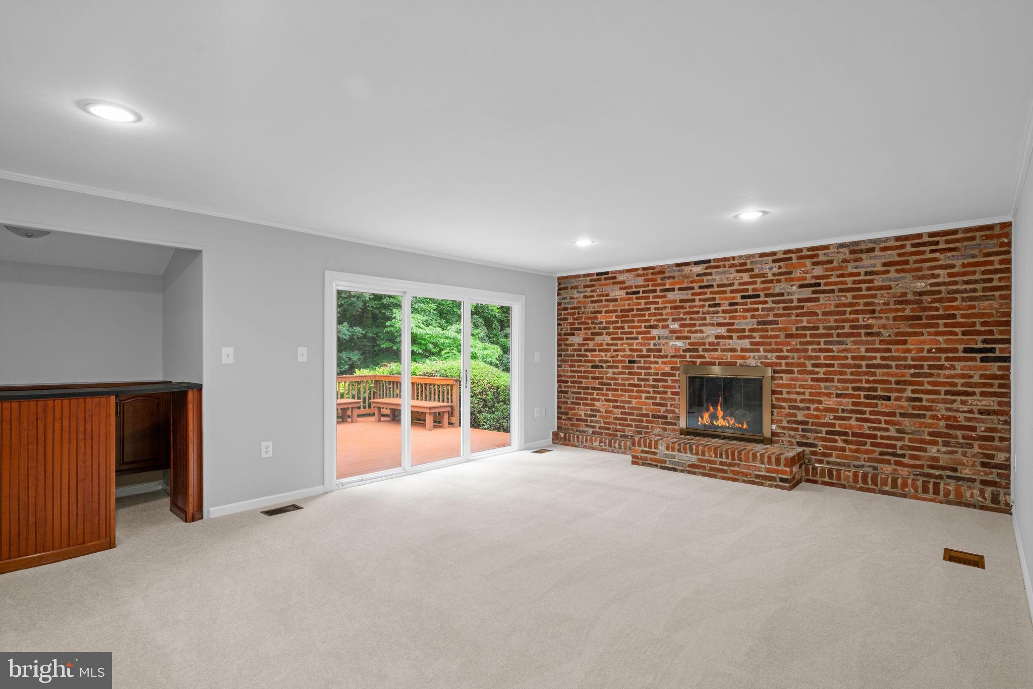 8005 Langbrook Road Springfield, VA 22152 - Photo 20 of 57 Family room off kitchen with new carpet and paint