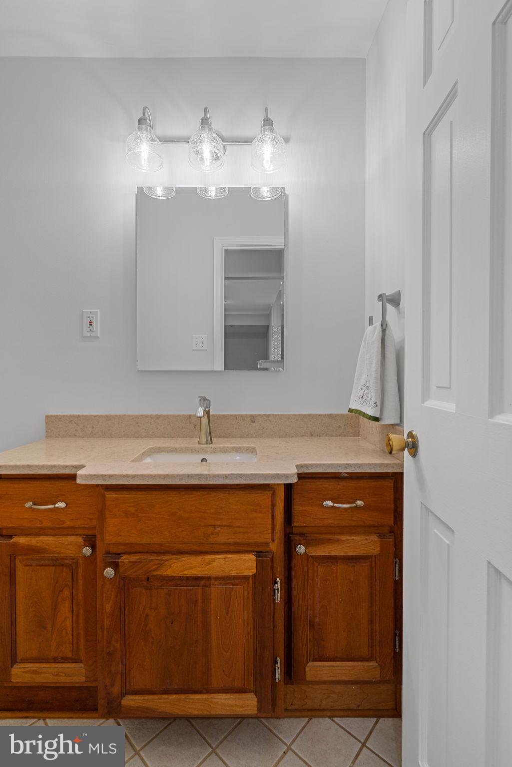 8005 Langbrook Road Springfield, VA 22152 - Photo 23 of 57 Main level half bath off family room