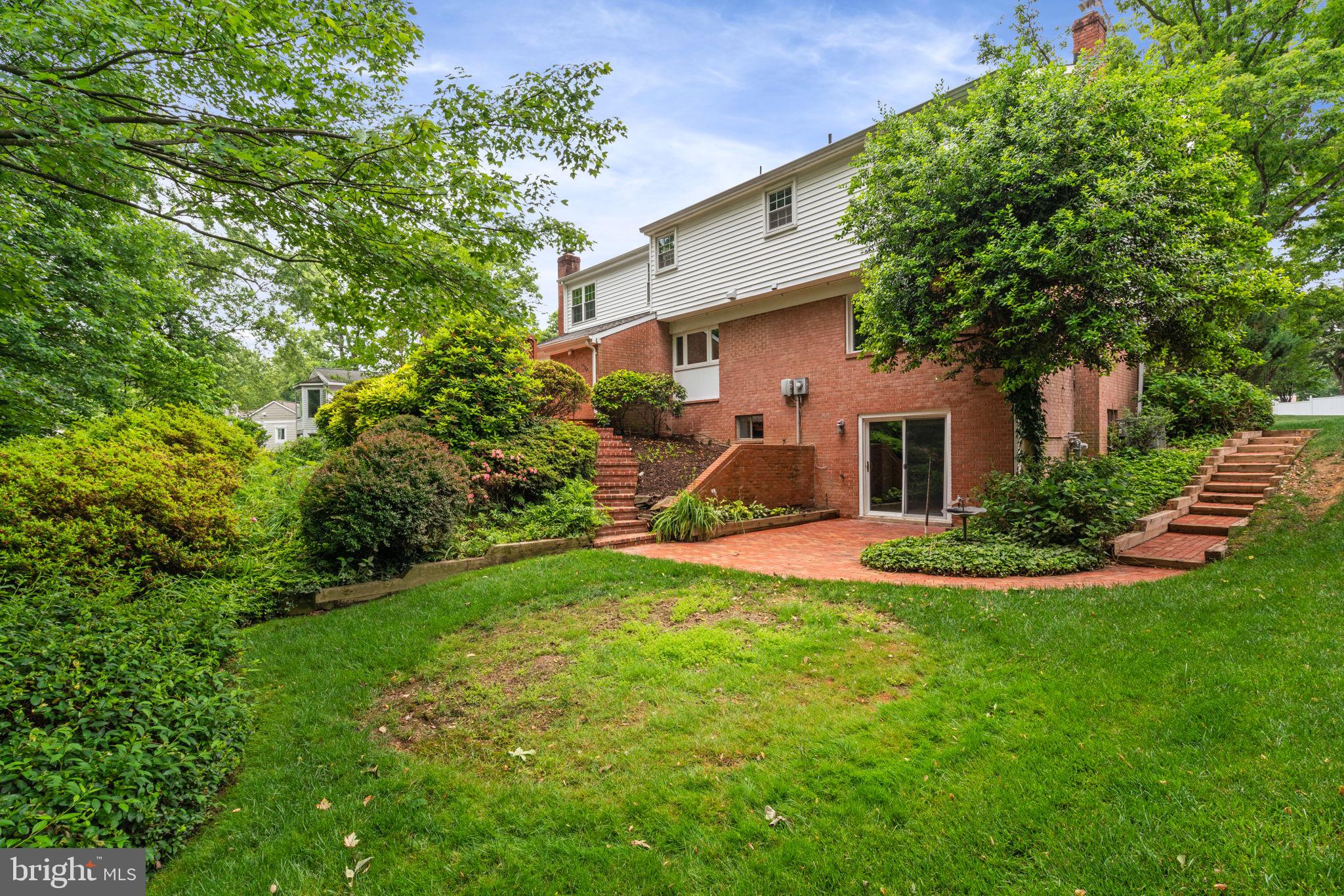 8005 Langbrook Road Springfield, VA 22152 - Photo 53 of 57 brick patio with slider to basement