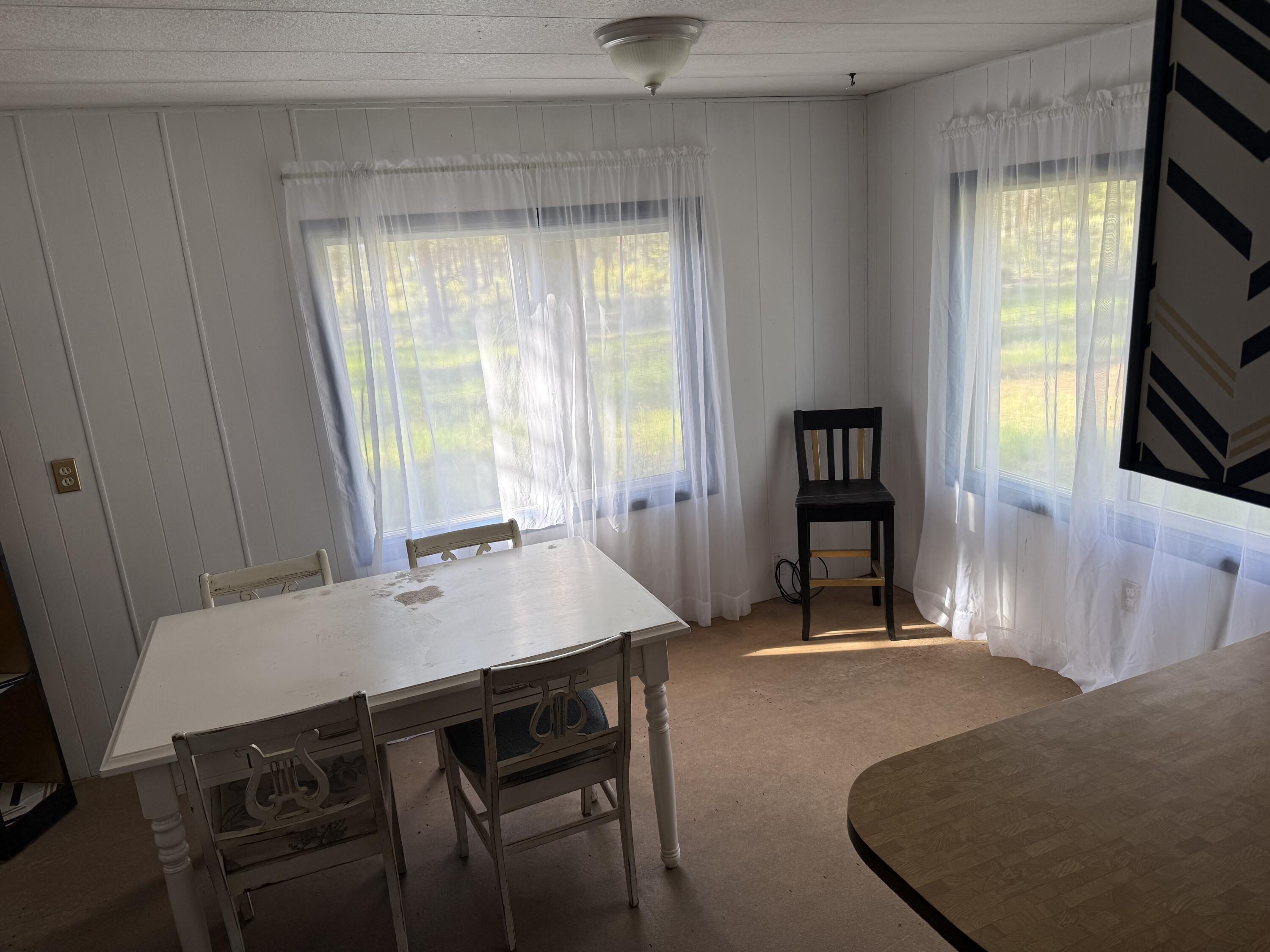 34614 Sprague River Road Sprague River, OR 97639 - Photo 24 of 24 a view of a dining room with furniture and window