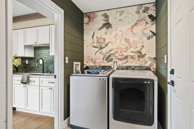 a utility room with dryer and washer