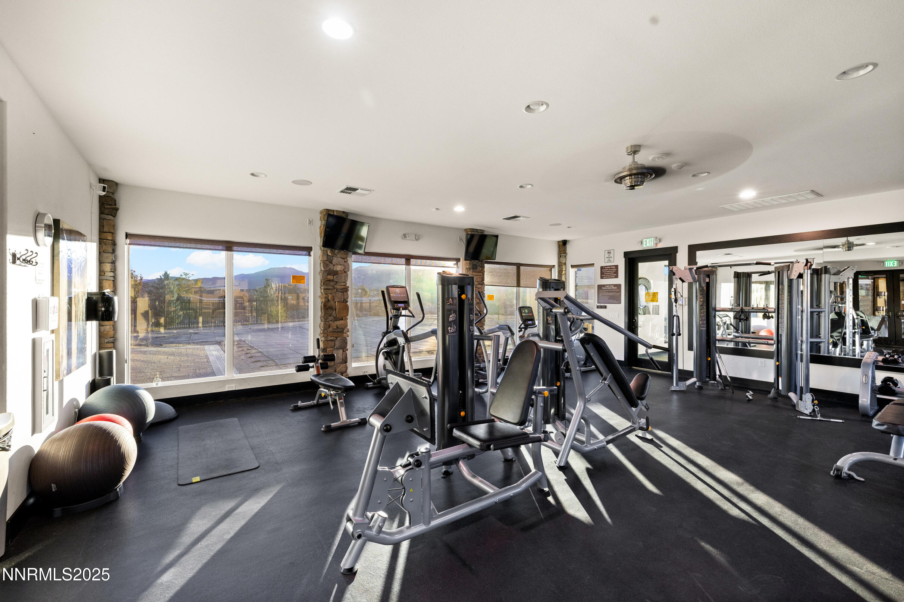 9845 Sea Breeze Lane Reno, NV 89521 - Photo 38 of 41 a view of a room with gym equipment
