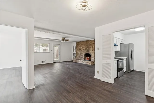 a view of a livingroom with wooden floor