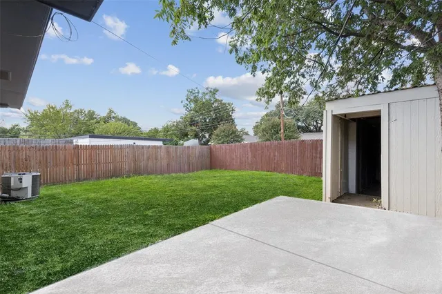 a view of a backyard with a garden