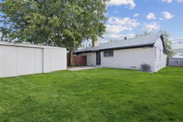 a view of a backyard with a garden