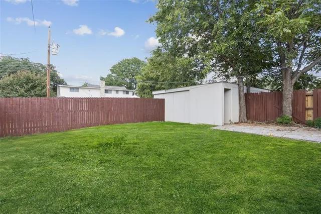 a view of a backyard with a garden