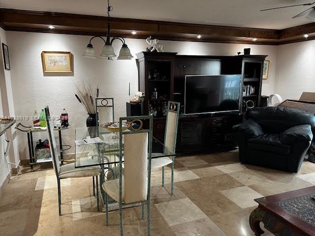 4751 Northwest 21st Street, Unit 605 Lauderhill, FL 33313 - Photo 2 of 12 a living room with furniture and a flat screen tv