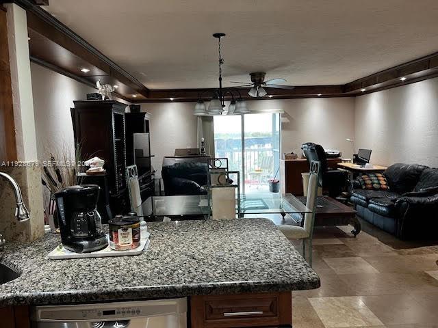 4751 Northwest 21st Street, Unit 605 Lauderhill, FL 33313 - Photo 3 of 12 a kitchen with counter top space cabinets and appliances