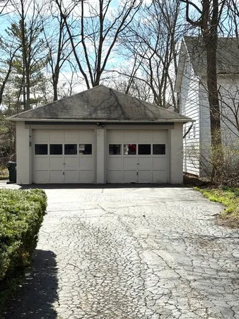 a house with trees in front of it