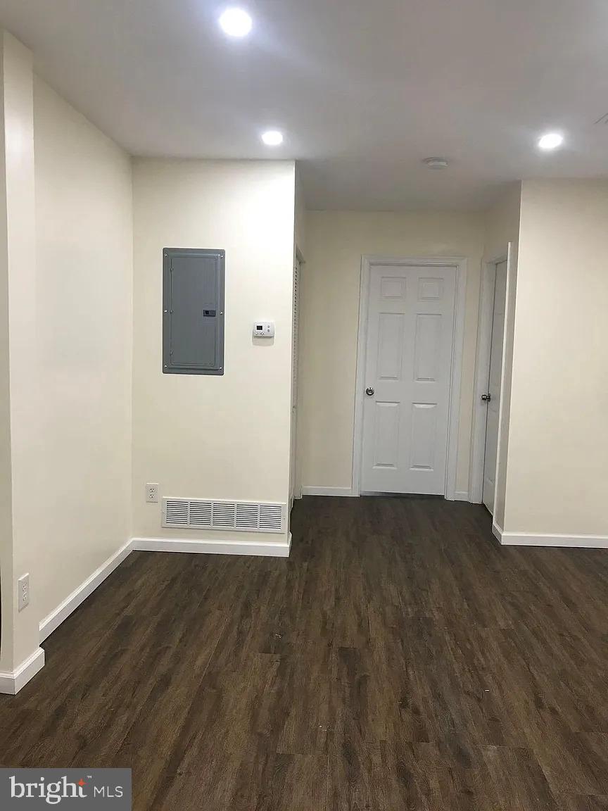 737 Spruce Street, Unit 3 Philadelphia, PA 19106 - Photo 5 of 15 wooden floor in an empty room