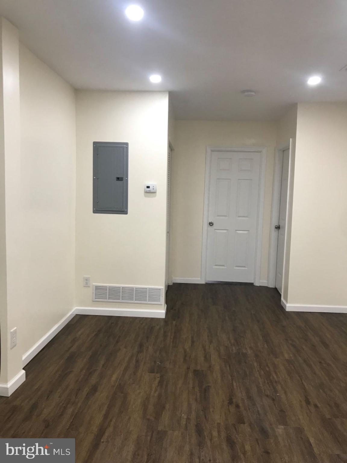 737 Spruce Street, Unit 3 Philadelphia, PA 19106 - Photo 10 of 15 wooden floor in an empty room