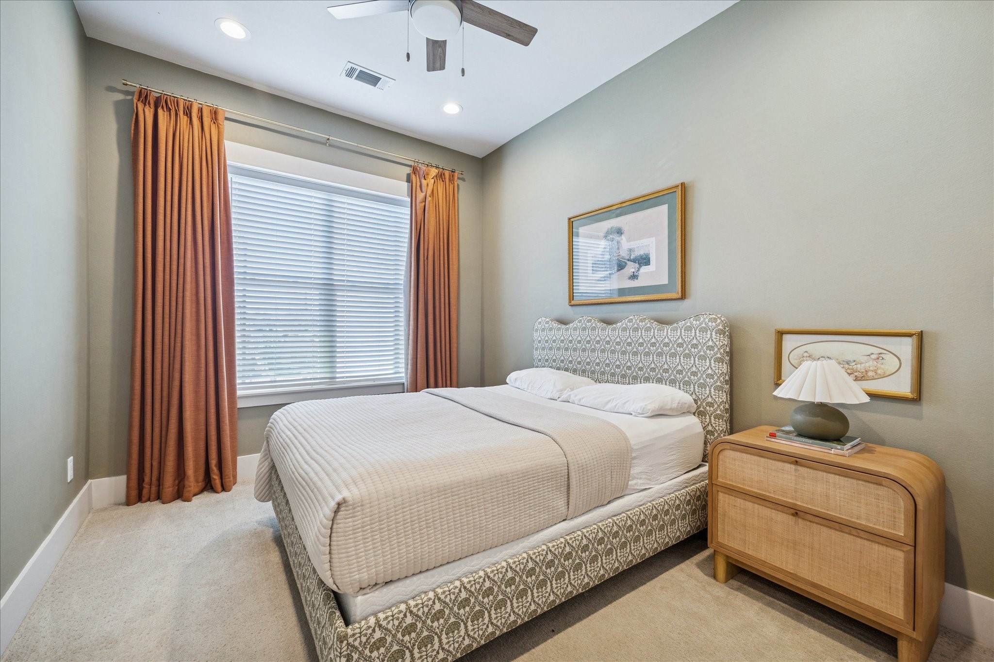 1311 Laird Street Houston, TX 77008 - Photo 16 of 29 a bedroom with a large bed and a window