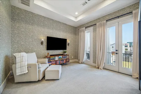 a view of a balcony with furniture