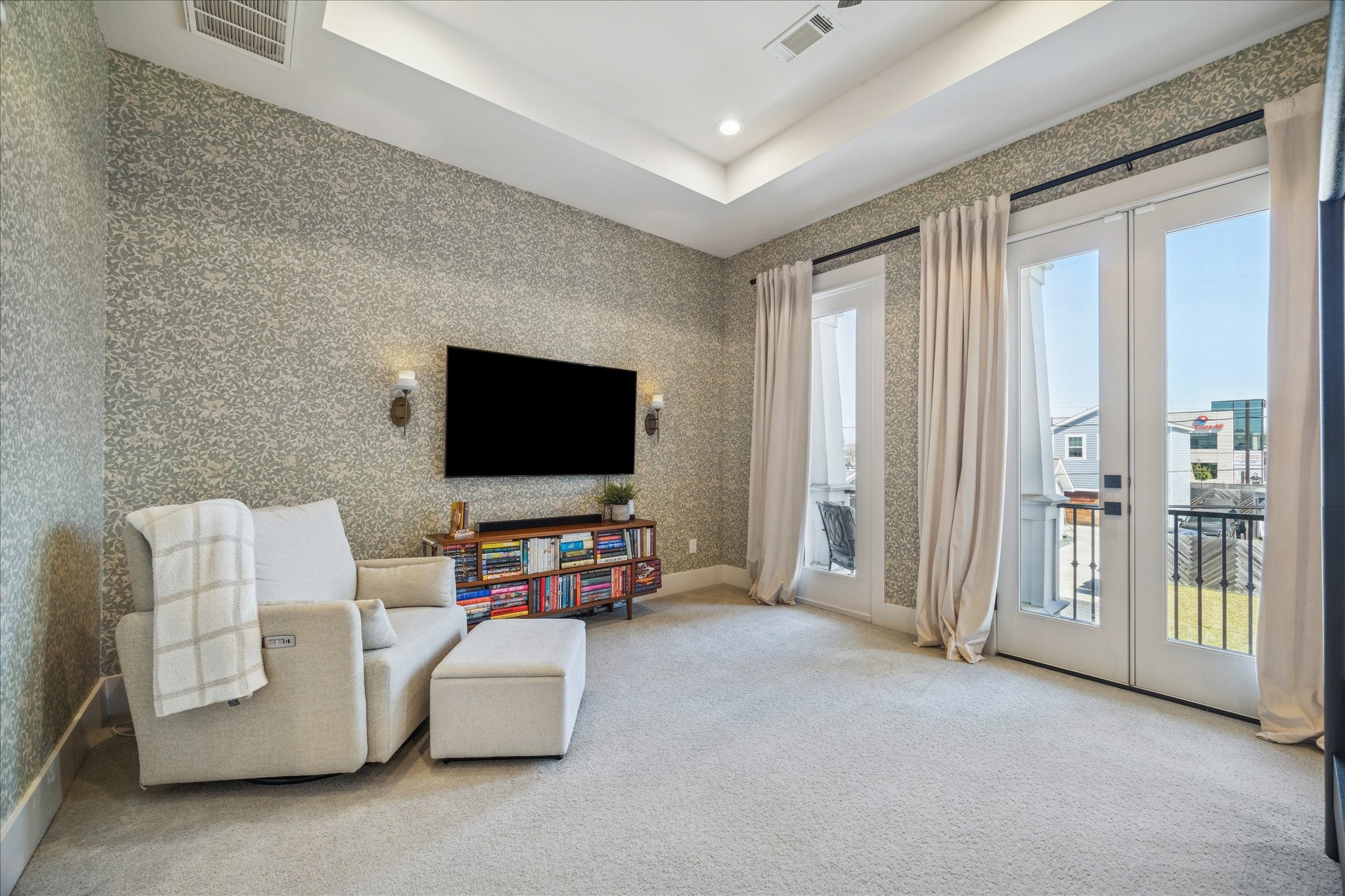 1311 Laird Street Houston, TX 77008 - Photo 22 of 29 a living room with furniture and a flat screen tv