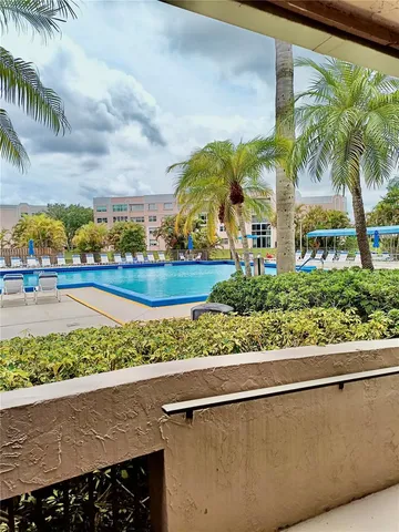 a view of parking space with cars parked