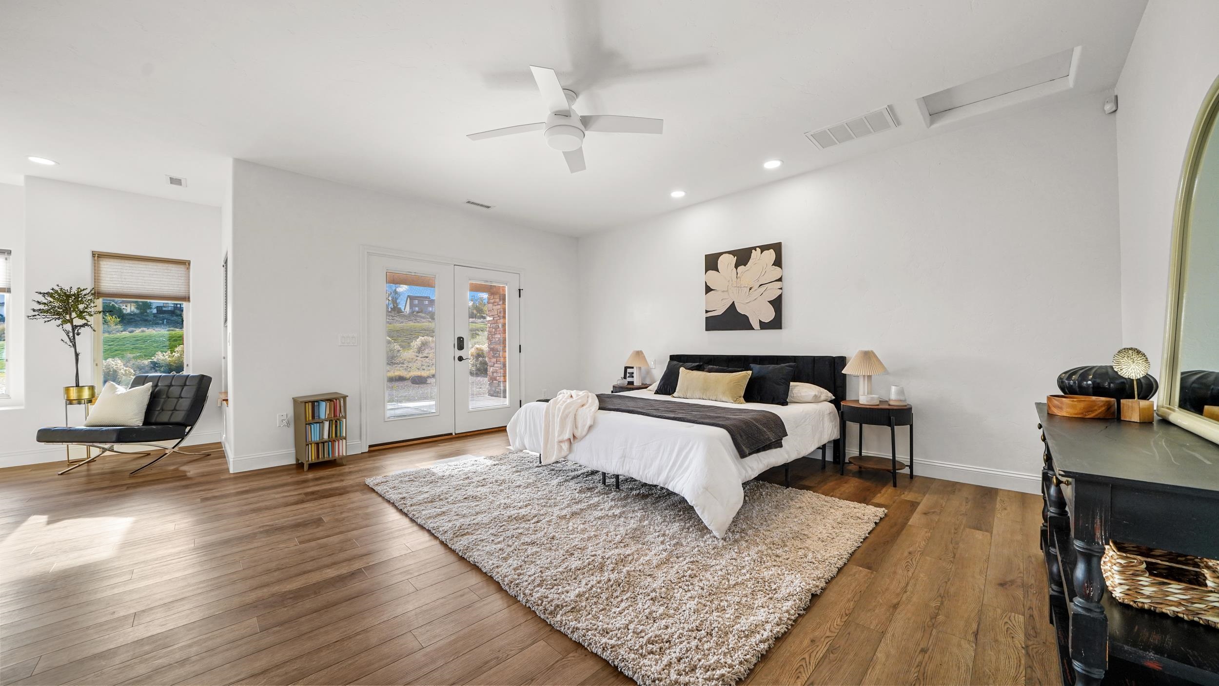 372 High Desert Road Grand Junction, CO 81507 - Photo 11 of 40 a living room with furniture and wooden floor