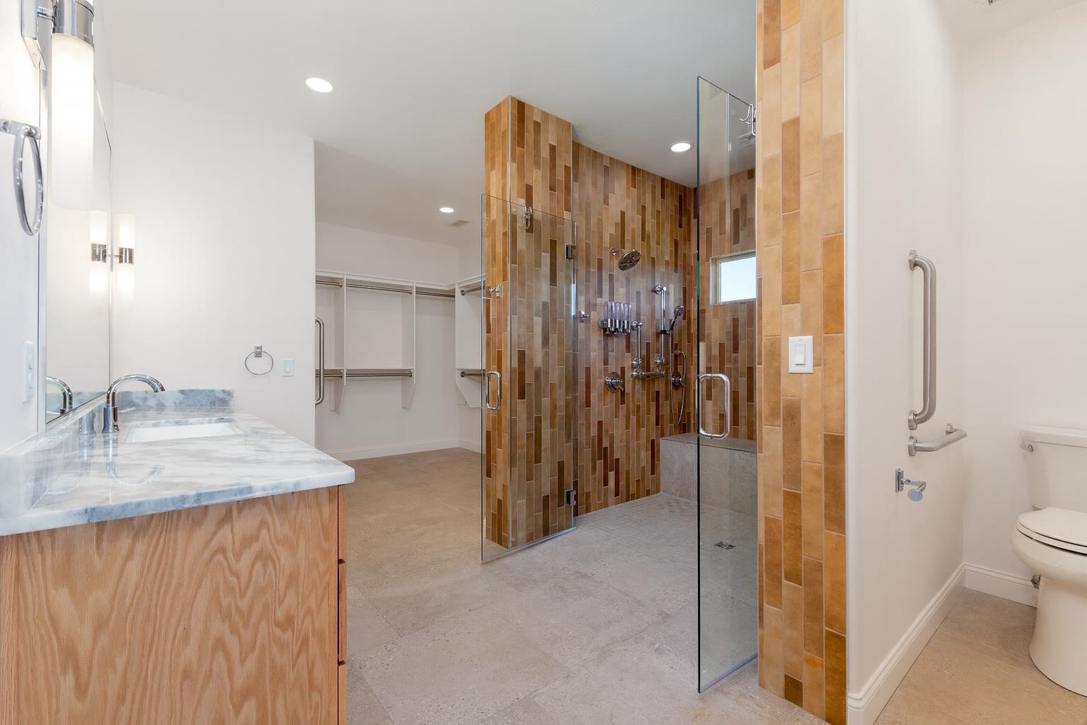 372 High Desert Road Grand Junction, CO 81507 - Photo 13 of 40 a bathroom with a granite countertop sink a toilet and shower