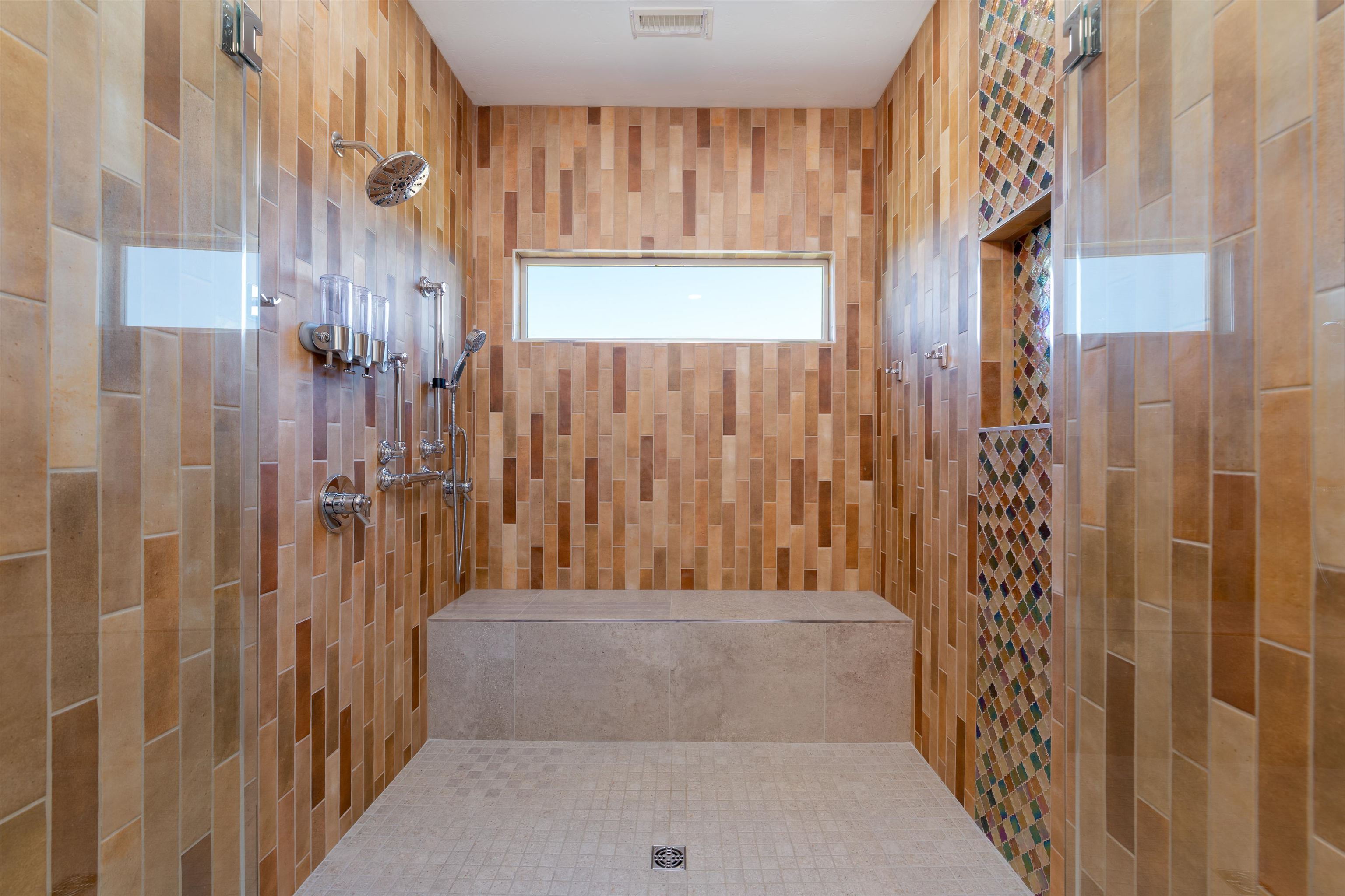 372 High Desert Road Grand Junction, CO 81507 - Photo 14 of 40 a bathroom with a bathtub and shower