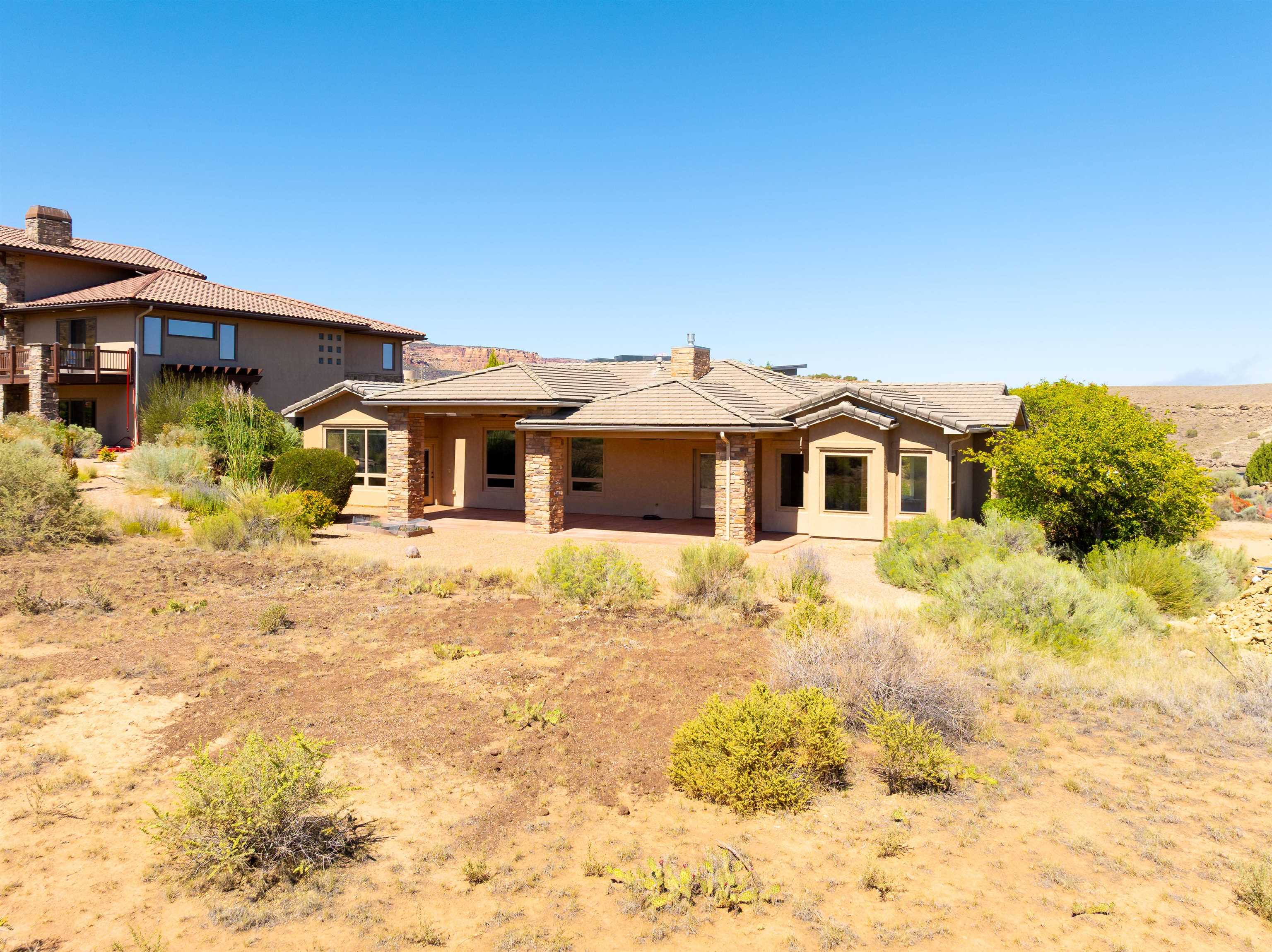 372 High Desert Road Grand Junction, CO 81507 - Photo 32 of 40 a front view of a house with a yard