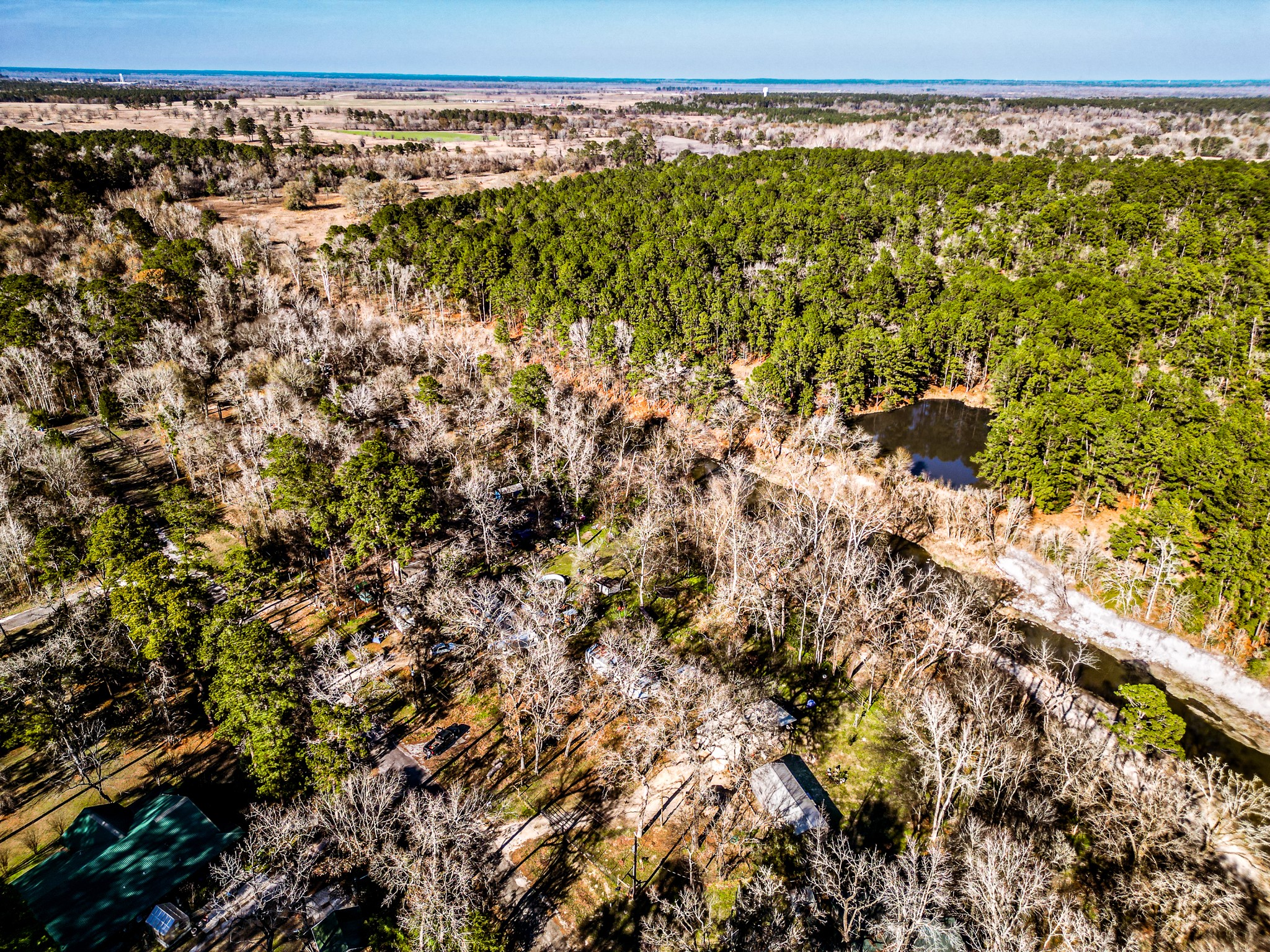 14 Creek Road Huntsville, TX 77320 - Photo 5 of 8 a view of a yard