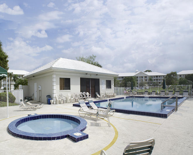 6037 Balboa Circle, Unit 405 Boca Raton, FL 33433 - Photo 2 of 39 2 pools, 2 spas