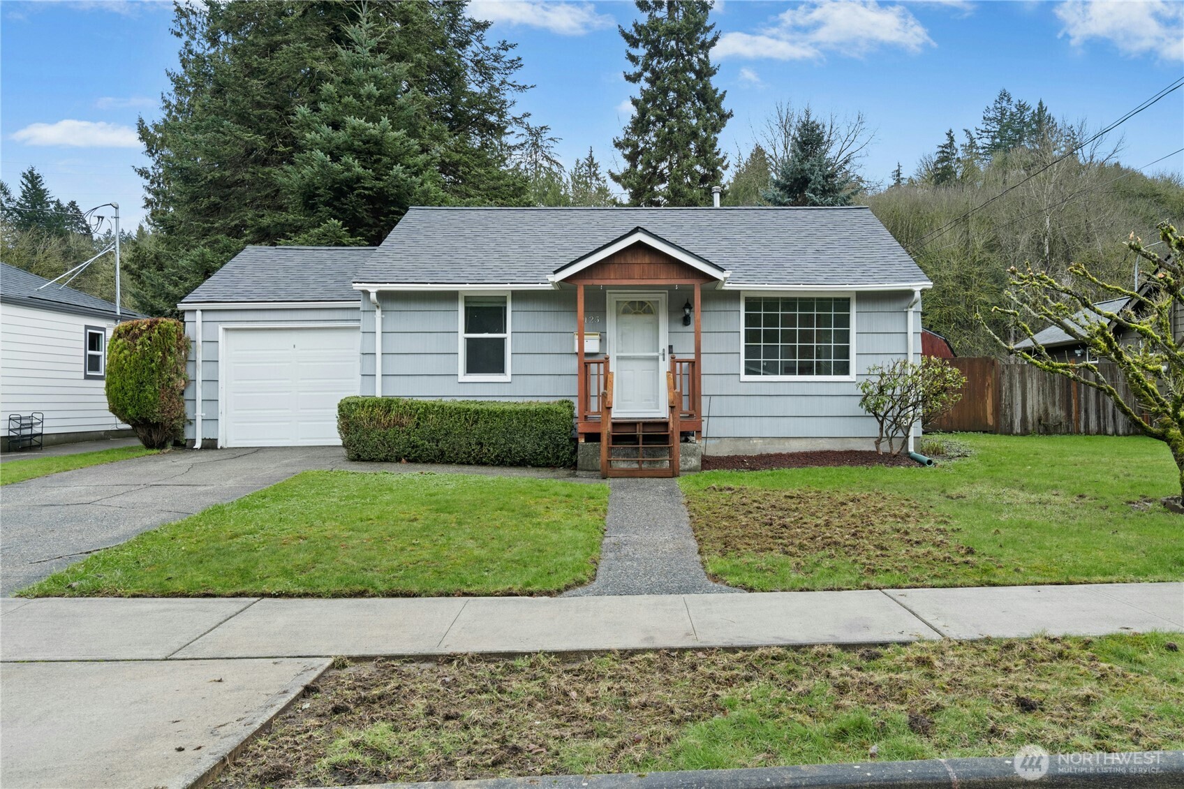 3125 Southeast 6th Street Renton, WA 98058 - Photo 1 of 27 front view of a house with a yard