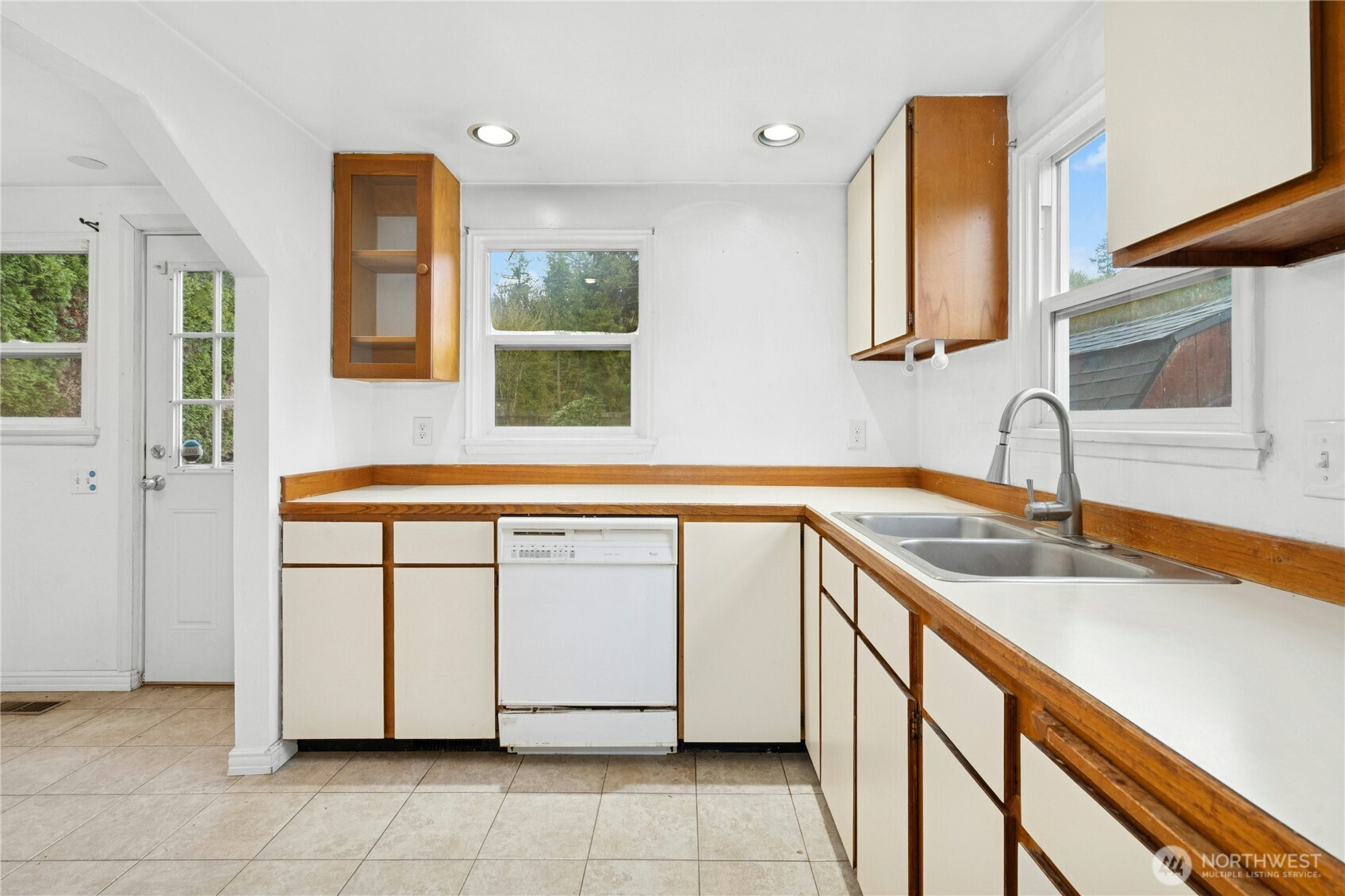 3125 Southeast 6th Street Renton, WA 98058 - Photo 14 of 27 a kitchen with a sink cabinets and window