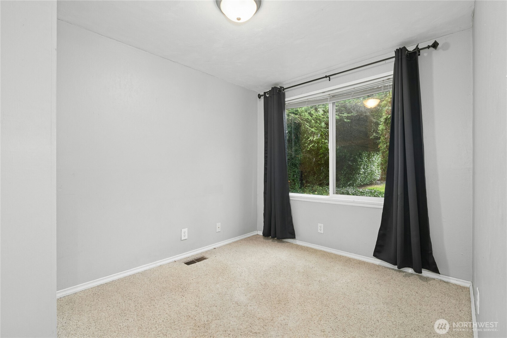 3125 Southeast 6th Street Renton, WA 98058 - Photo 15 of 27 a view of an empty room with a window