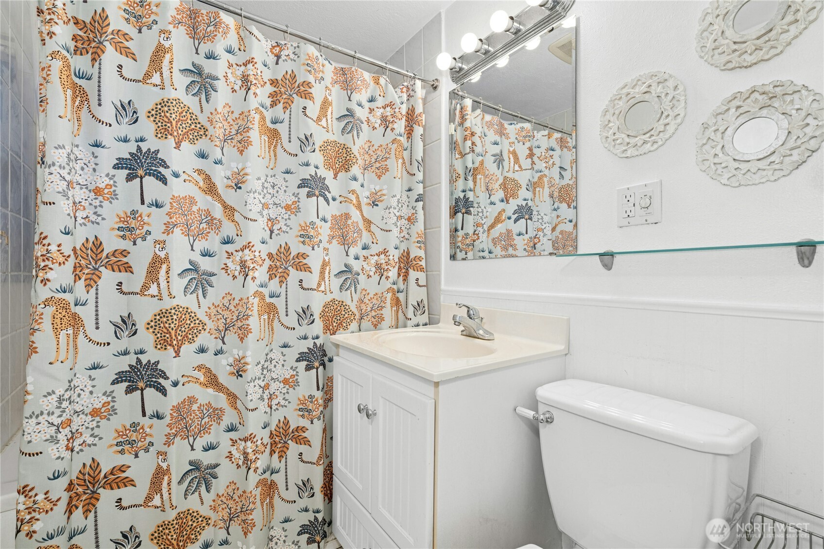 3125 Southeast 6th Street Renton, WA 98058 - Photo 17 of 27 a bathroom with a toilet and a sink