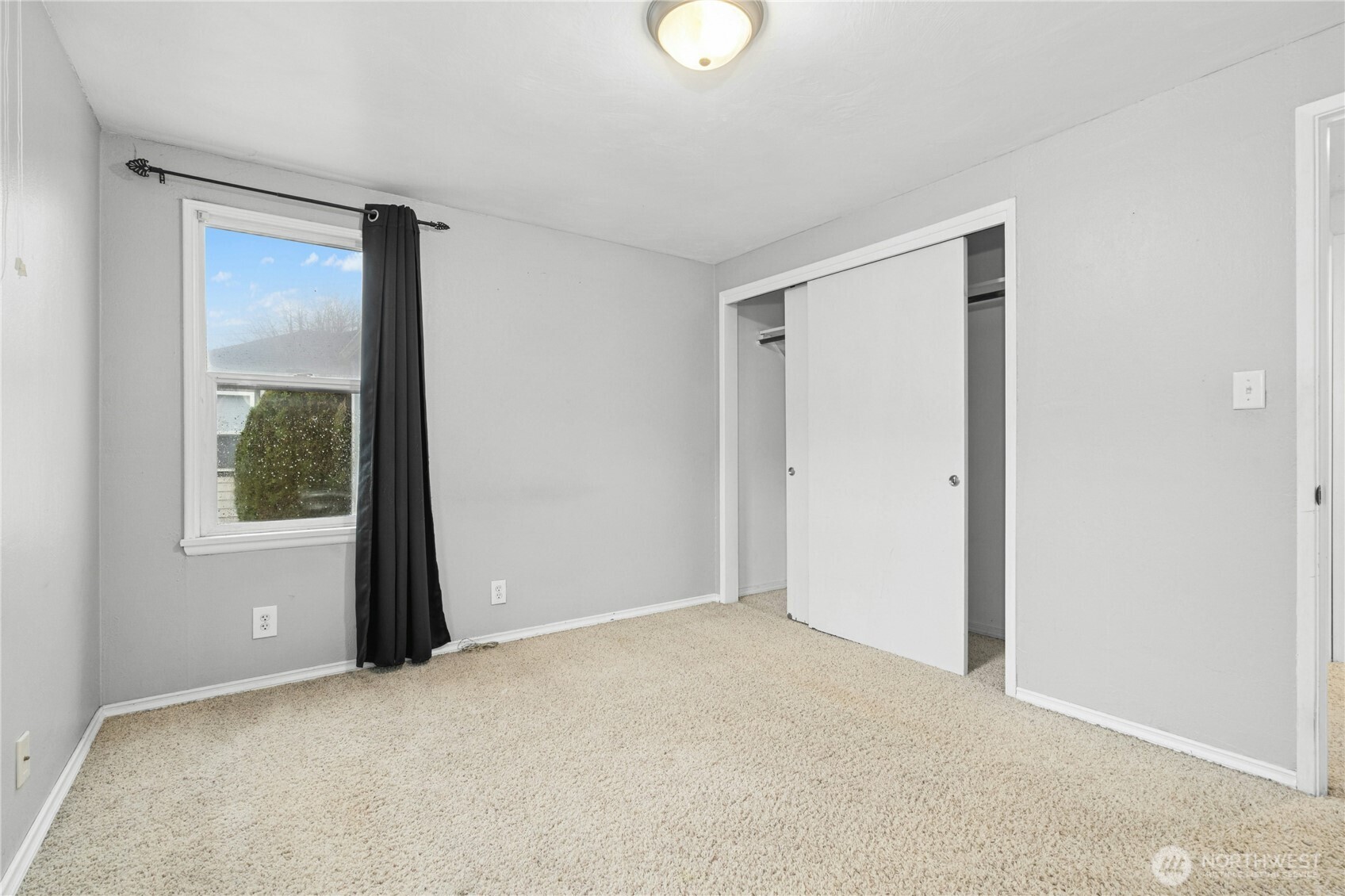 3125 Southeast 6th Street Renton, WA 98058 - Photo 19 of 27 a view of an empty room with a window