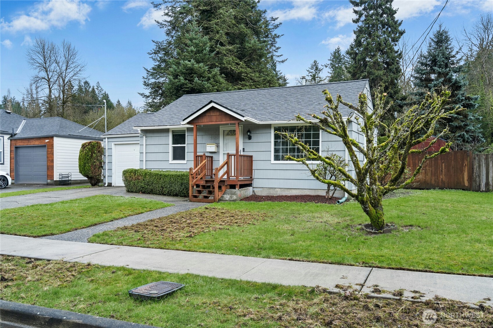 3125 Southeast 6th Street Renton, WA 98058 - Photo 2 of 27 a view of a house with a yard