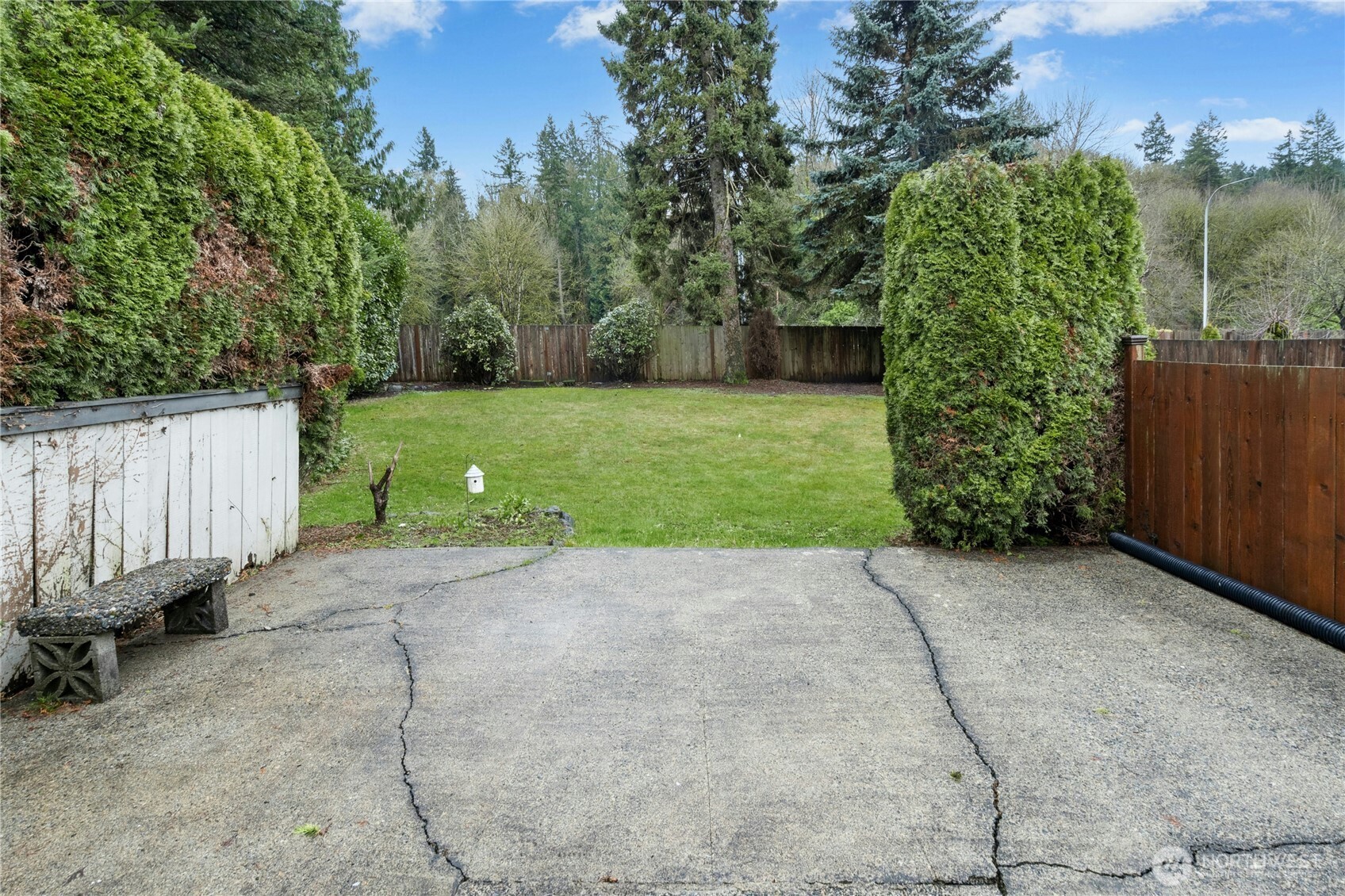 3125 Southeast 6th Street Renton, WA 98058 - Photo 21 of 27 a view of a garden with wooden fence