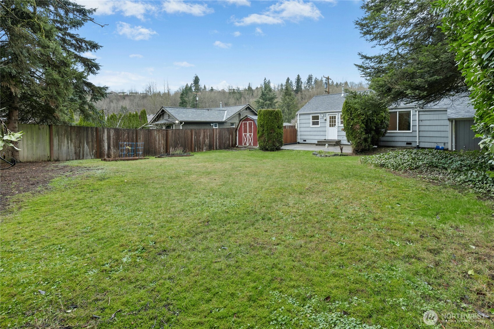 3125 Southeast 6th Street Renton, WA 98058 - Photo 27 of 27 a view of a barn in the middle of a yard