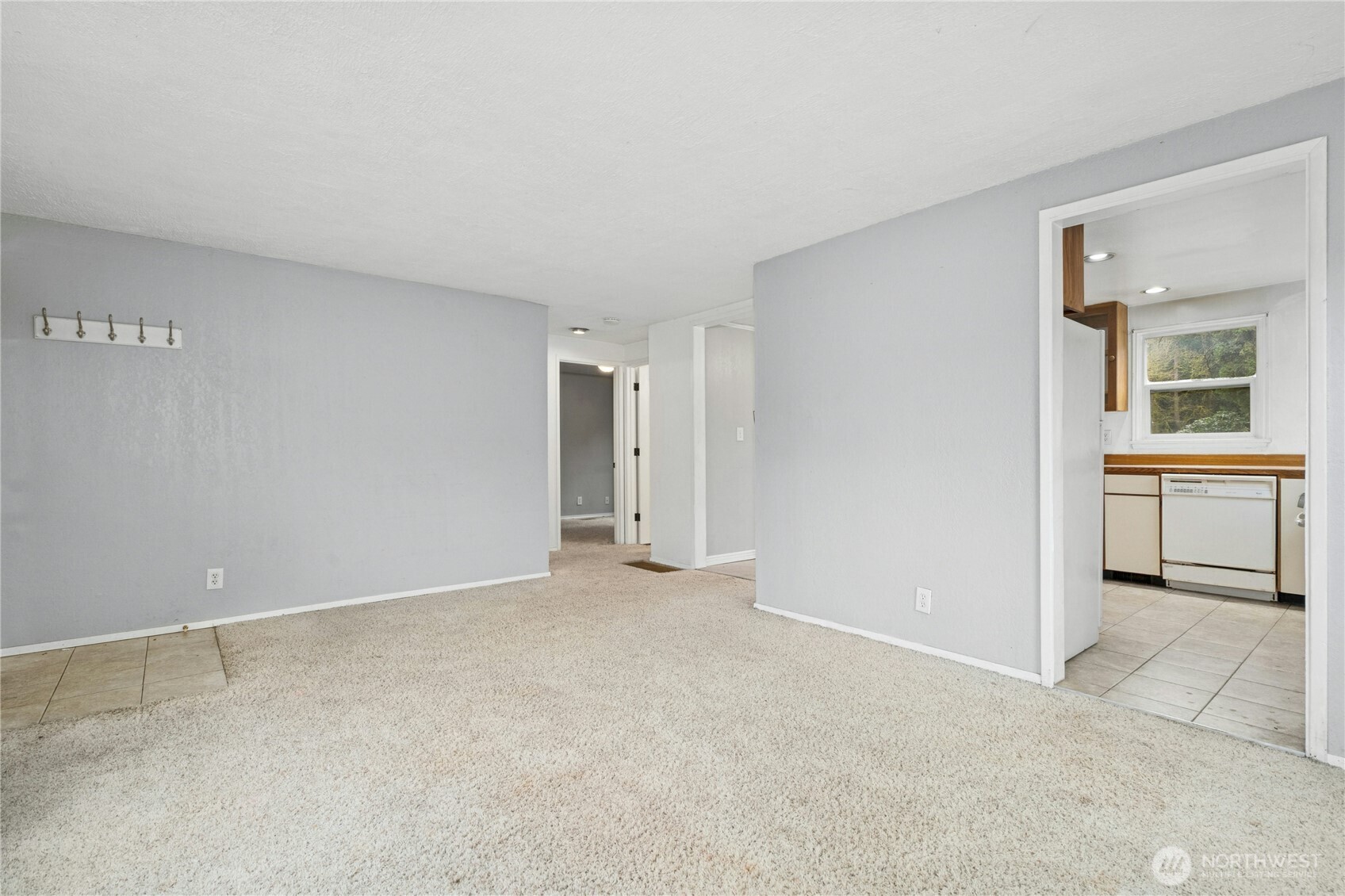 3125 Southeast 6th Street Renton, WA 98058 - Photo 8 of 27 a view of an empty room with a window