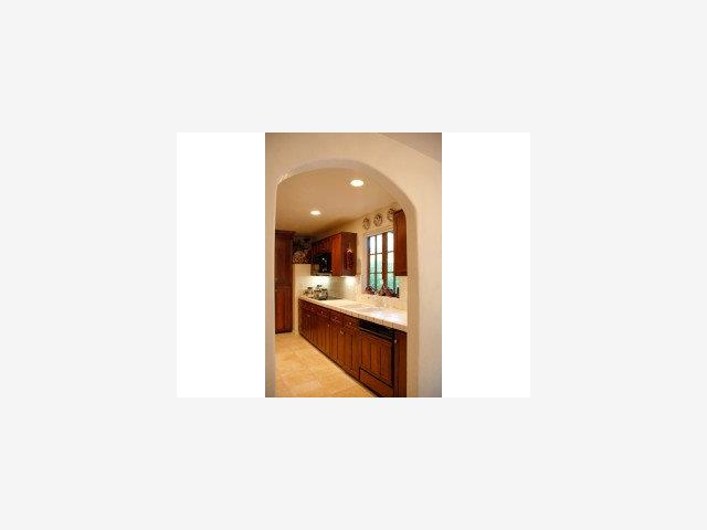 987 Customs Road Pebble Beach, CA 93953 - Photo 3 of 9 a open living room with a couch and a view of living room