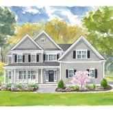 a front view of a house with a yard table and chairs