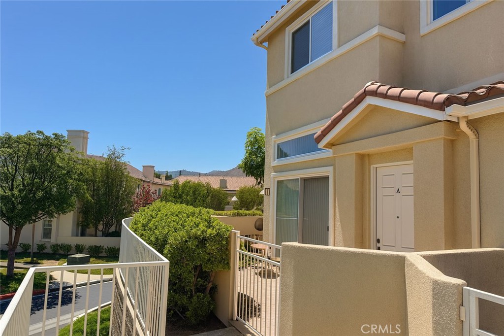 25768 Perlman Place, Unit A Stevenson Ranch, CA 91381 - Photo 8 of 20 a view of an house with roof deck and furniture