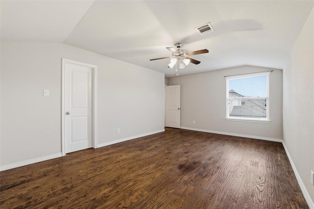 420 Prairie Run Aledo, TX 76008 - Photo 26 of 38 a view of an empty room with a window and wooden floor