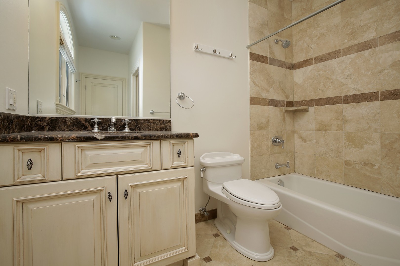 1000 Willow Road Winnetka, IL 60093 - Photo 17 of 26 a bathroom with a sink toilet vanity and shower