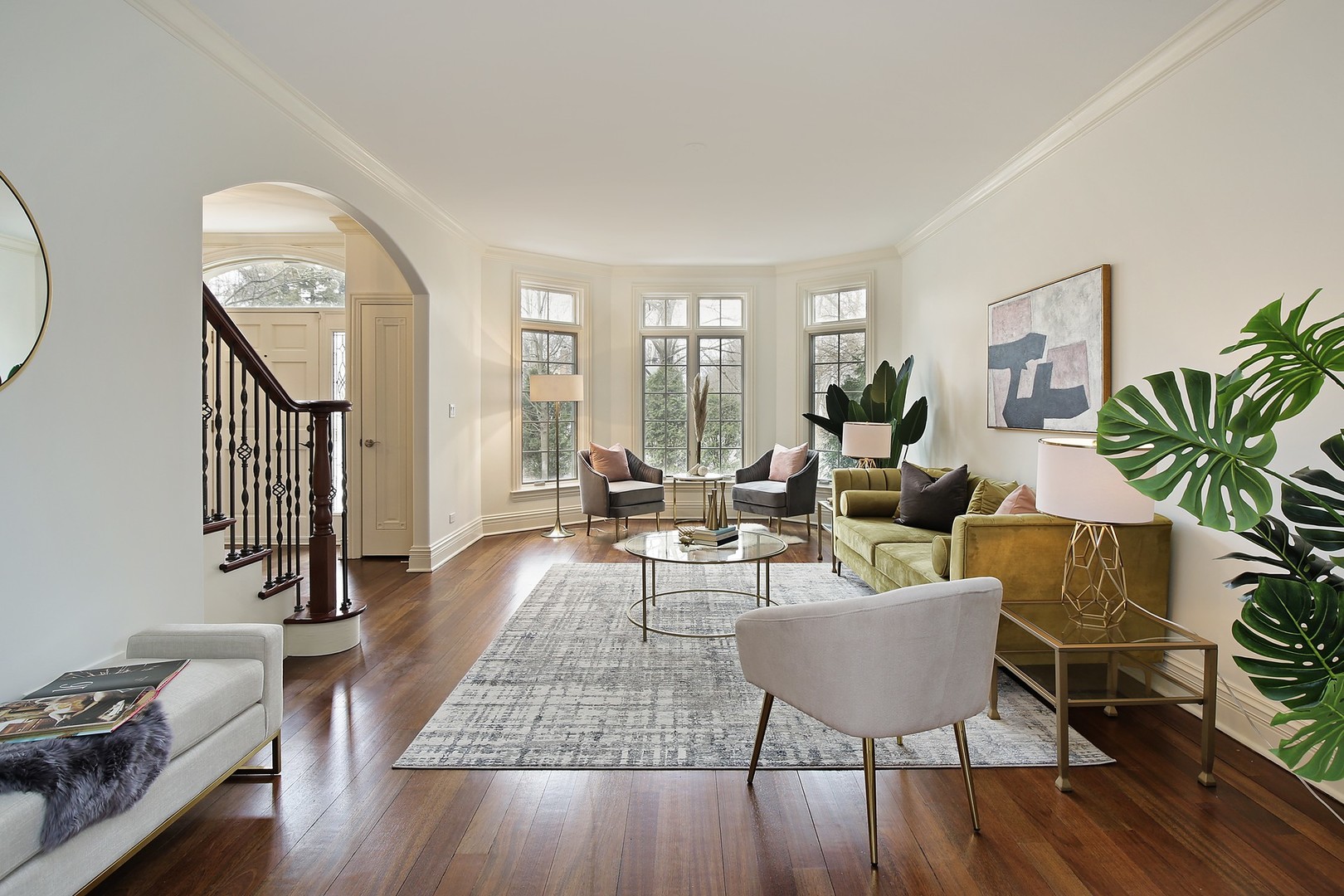 1000 Willow Road Winnetka, IL 60093 - Photo 3 of 26 a living room with furniture floor to ceiling window and wooden floor