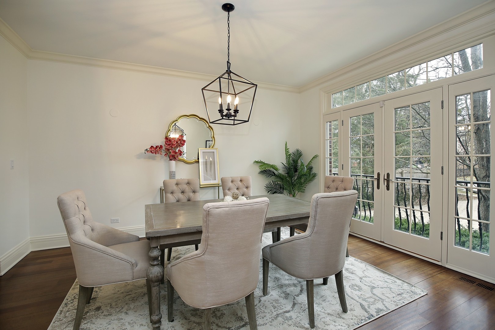 1000 Willow Road Winnetka, IL 60093 - Photo 4 of 26 a view of a dining room with furniture window and wooden floor