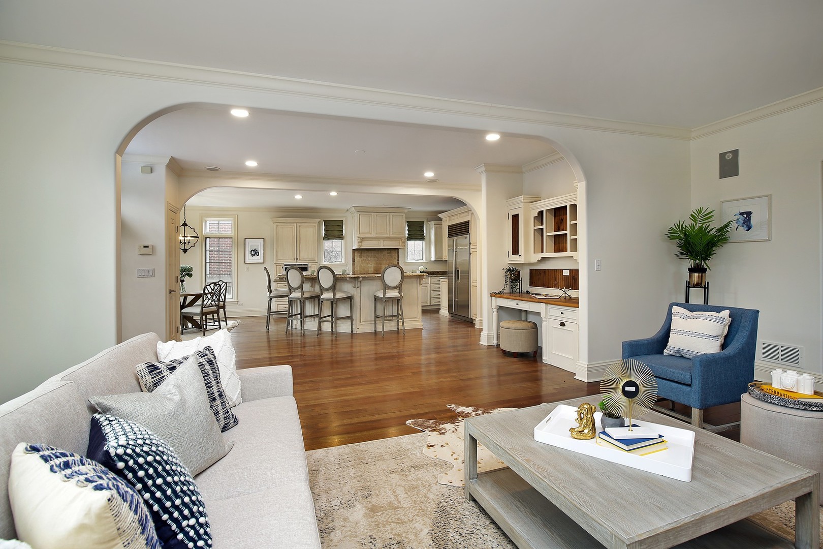 1000 Willow Road Winnetka, IL 60093 - Photo 6 of 26 a living room with furniture and a view of kitchen