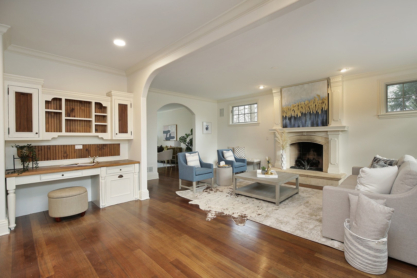 1000 Willow Road Winnetka, IL 60093 - Photo 7 of 26 a living room with furniture a fireplace and wooden floor