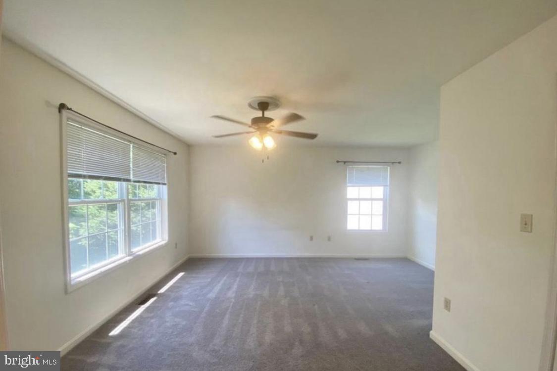 30 Acacia Place Dover, DE 19901 - Photo 2 of 5 a view of empty room with window