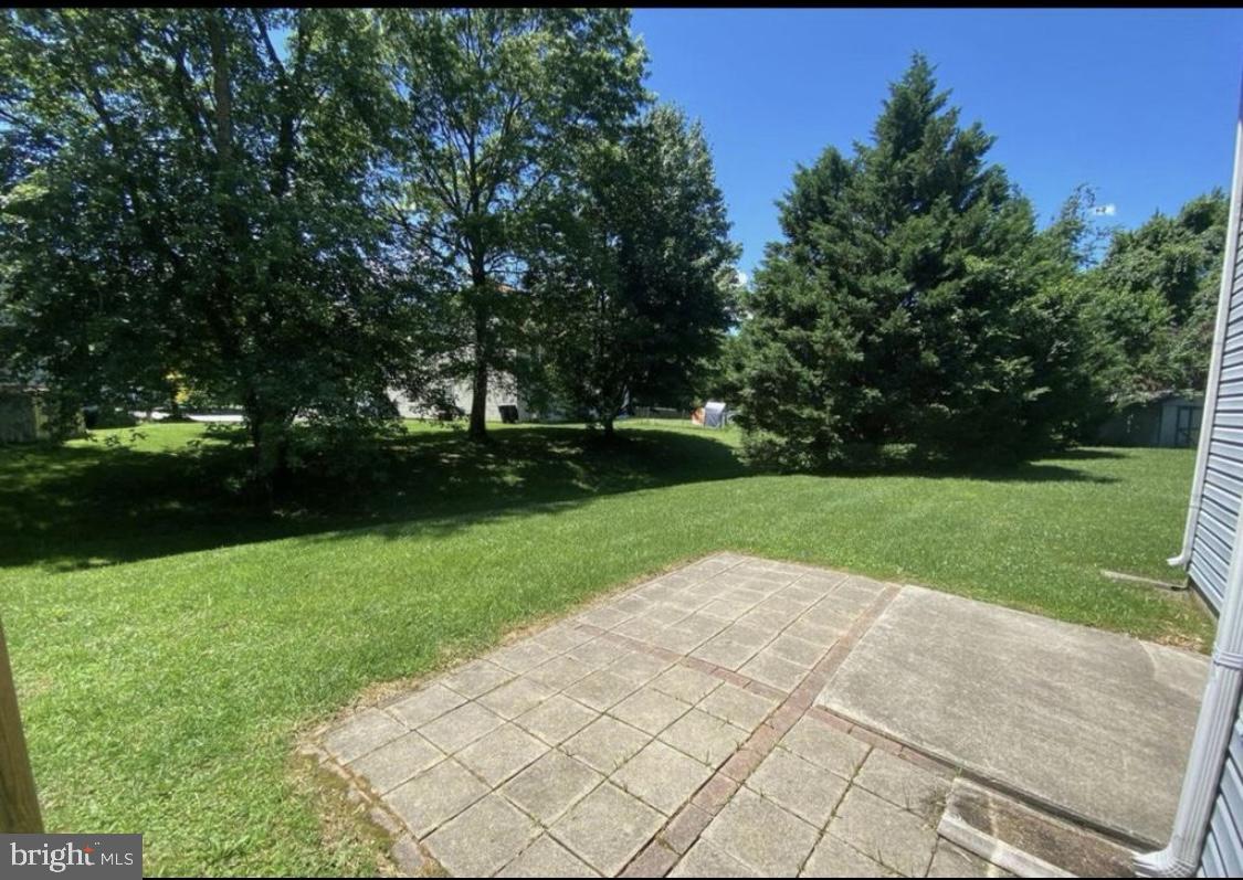 30 Acacia Place Dover, DE 19901 - Photo 5 of 5 a view of outdoor space with deck and yard