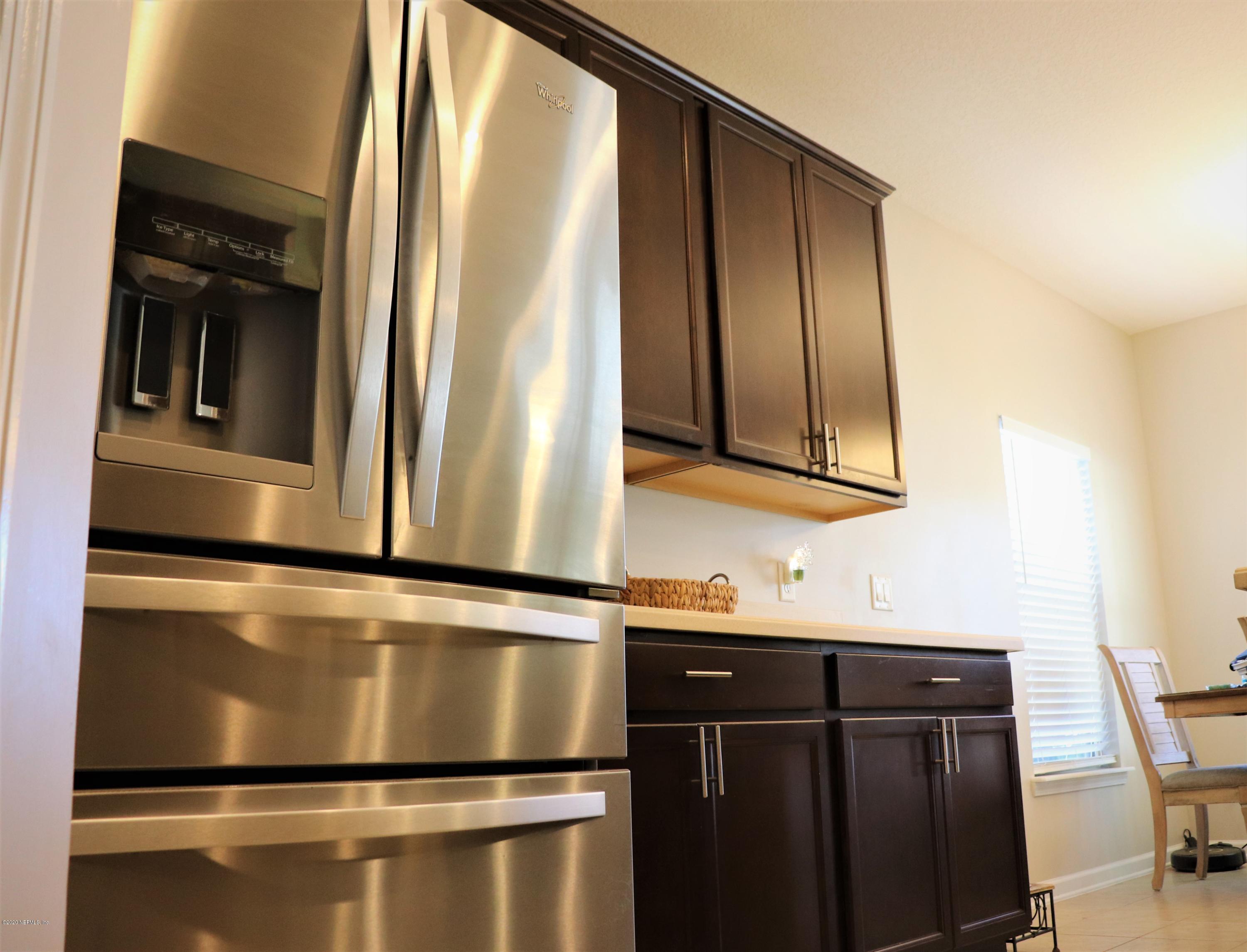 12294 Rouen Cove Drive Jacksonville, FL 32226 - Photo 23 of 41 a close view of washer and dryer
